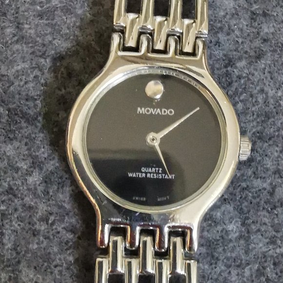 Ladies Movado Watch, stainless steel watch and strap, adjustable, size 7.5 now. - Picture 9 of 10